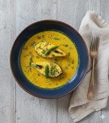 Chef Urmi cooking authentic Bengali food in Chicago kitchen