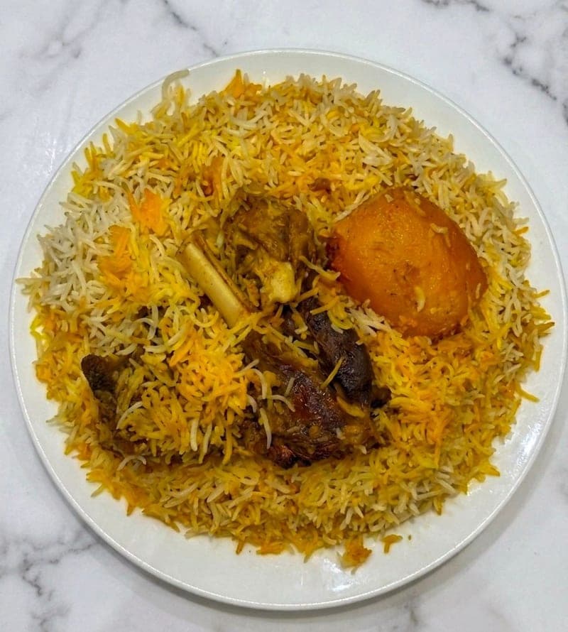 Kolkata Mutton Biryani - Authentic Bengali dish in Chicago